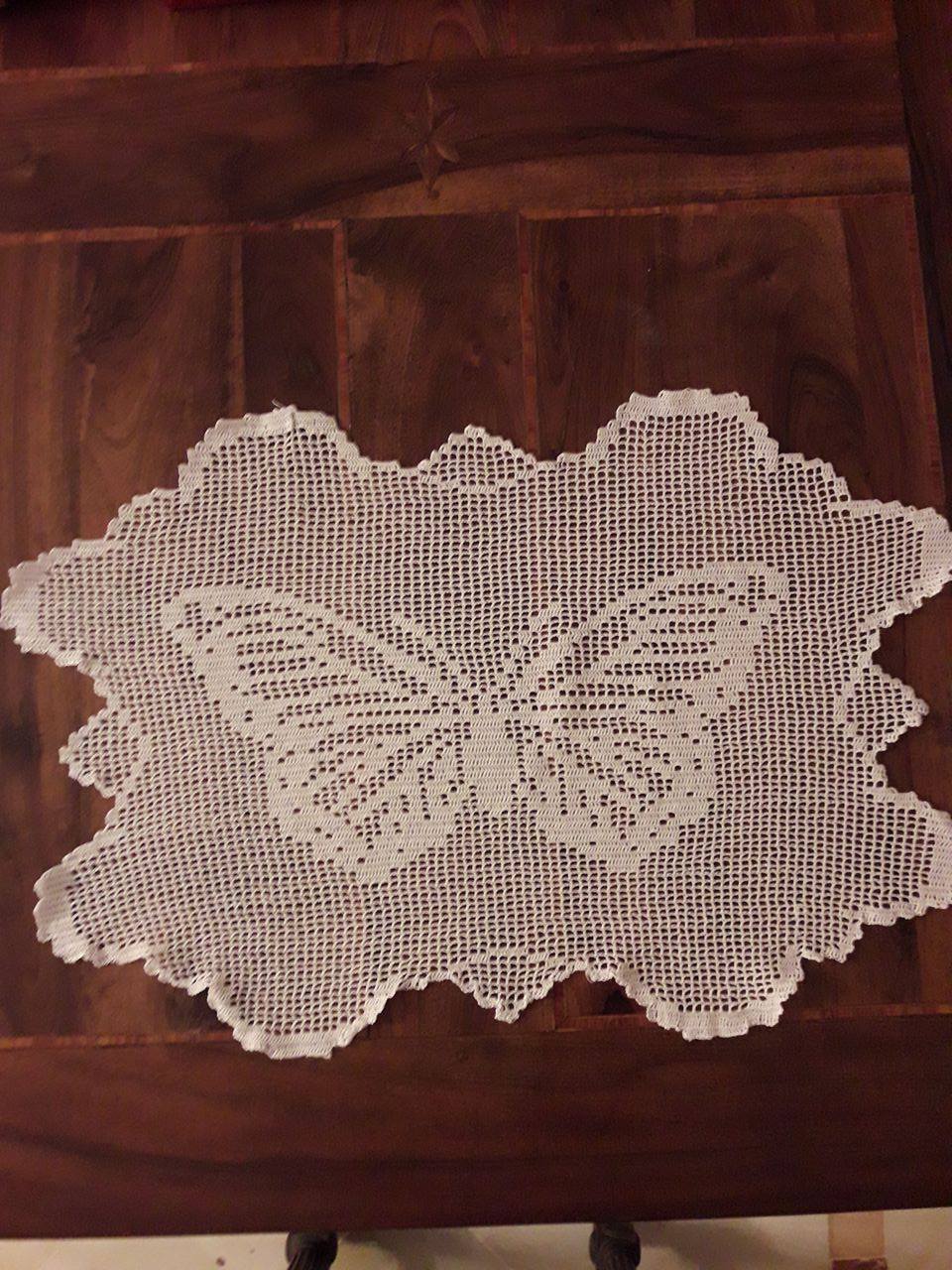 Crochet filet doily with butterfly work photo by Facebook Fan Mario Gatti